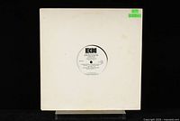 Front view of white label promo vinyl record in a plain white sleeve with ECM label logo.