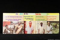 Front view of the four jazz LP covers laid side by side showing the artists and titles related to New Orleans jazz at Preservation Hall.