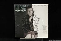 Front cover of the vinyl LP showing Philip Glass portrait and album title