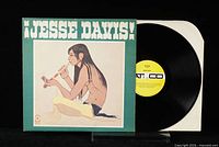 Front cover art of Jesse Davis! LP showing Native American man playing a flute with teal border and album title at top.