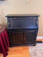 Front view of closed drop-front secretary desk