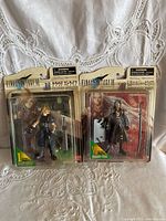 Front view of Bandai Extra Knights Final Fantasy VII Cloud Strife and Sephiroth action figures in original packaging.
