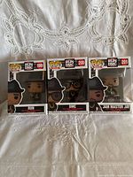 Front view of three Funko Pop! figures in original boxes: Run (199), DMC (200), Jam Master Jay (201)