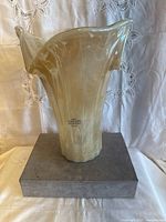 Front view of Murano Italian glass vase showing flared top and cream swirl pattern.