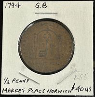 Obverse of 1794 half penny showing key symbol and Norwich marketplace inscription in a protective holder with handwritten notes.