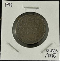 Reverse side of the coin showing denomination 'One Cent', date range '1908-1998' and decorative border.