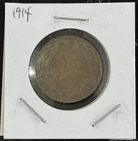 Reverse side of the 1914 Canadian Large One Cent coin showing a detailed wreath design and date.