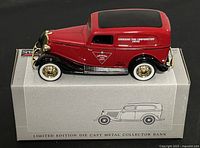 Side view of the red and black 1934 Ford Sedan Delivery die cast metal bank showing Canadian Tire logos and detailed wheels.