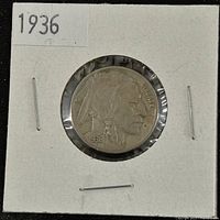 Obverse (front) side of the 1936 Buffalo Nickel showing Native American profile in protective holder.