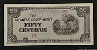 Front side of the 1942 Japanese Government issued 50 Centavos banknote from the Philippines during WWII, featuring denomination, text and palm tree illustration.