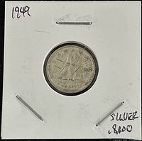 Reverse side showing sailboat, the year 1949 and 'DIME' inscription.