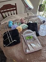 Mixed bath and health items layout on a textured fabric surface