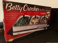 Retail box showing product features and brand