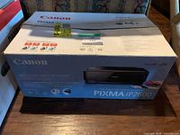 Front view of boxed Canon PIXMA iP2600 printer