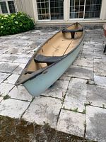 Full view of canoe showing entire hull and interior