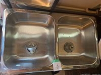 Top view of the double stainless steel sink showing both basins