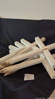 Pile of white wooden stake crosses