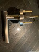 Satin nickel lever showing handle and spindle