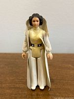 Front view of vintage Princess Leia Star Wars action figure showing character details and vintage wear.