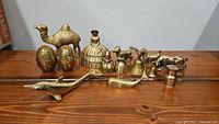 full group of 14 brass items displayed