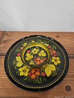 Top view of tray with bowl centered, showing painted motif