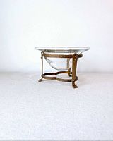 full view of glass bowl on brass stand