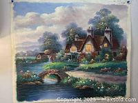View of the full oil painting showing a cottage with lit windows, surrounding garden, stone bridge, stream, and trees under a partly cloudy sky.