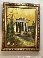 Photo of the oil painting on board showing a classical temple scene with columns, framed in a gold carved frame.