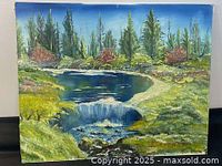 Full view of the oil painting showing a natural landscape with a pond, waterfall, pine trees and greenery.