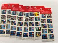 Eight sheets of Canada Post postage stamps, each containing 10 self-adhesive stamps with a face value of $0.51 totaling $5.10 per sheet. Stamps display various Canadian imagery with colorful design.
