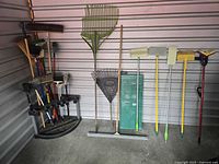 overall view of assorted tools and rack