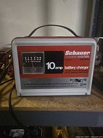 Front view showing brand, model, 10 amp rating and ammeter