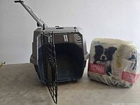 Carrier open next to sealed diaper pack