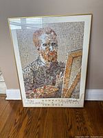 Front view of the framed mosaic-style portrait print of Van Gogh with gold metal frame and visible water damage on bottom.