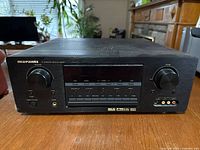 Front view of Marantz SR4400 surround receiver showing control buttons and analog inputs on the right side.
