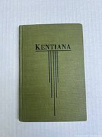 Green hardcover book of Kentiana with black title text on cover