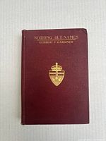 Front cover of 'Nothing But Names' by Herbert F. Gardiner showing gold embossed title, author, and crest on a maroon background.
