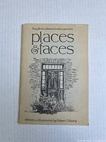 Front cover of the signed book "Places & Faces" featuring an illustration of a door and foliage, with title and author name visible.