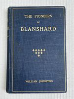 Front cover of 'The Pioneers of Blanshard' showing title, author, and minor wear.