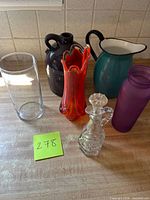 Group shot of all six vessels on countertop