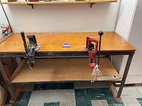 Full view of workbench with two presses and power strip