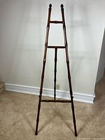 Full view of faux bamboo wooden art easel
