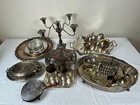 Group shot of entire silverplate lot showing all items