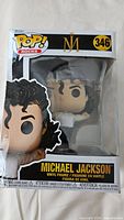 Front view of Michael Jackson Funko Pop vinyl figure in original box, showing figure and packaging details.