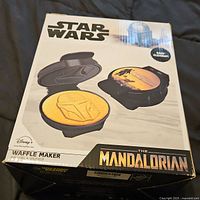 Box of Star Wars The Mandalorian waffle maker showing product image and branding.