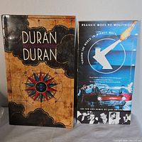 Photo of Duran Duran and Frankie Goes to Hollywood vintage programs showing cover designs