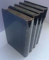 Four volumes upright showing spines