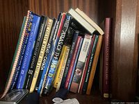 Bookshelf with assorted books mainly about history and geography.