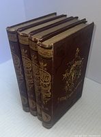 Four-volume set of 'The Scot in British North America' showing spines and front covers with gold embossing.