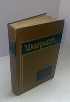 Hardcover book showing front cover and spine with title 'Warpath The Story of the Algonquin Regiment 1939-1945'